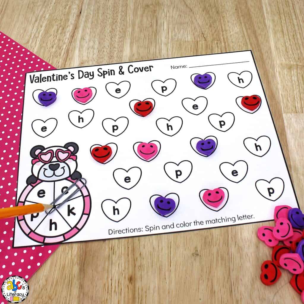 Free printable, no-prep Valentine Alphabet Worksheets for Preschool: Spin and color or cover lowercase letters in this themed activity Valentine's Day alphabet worksheets