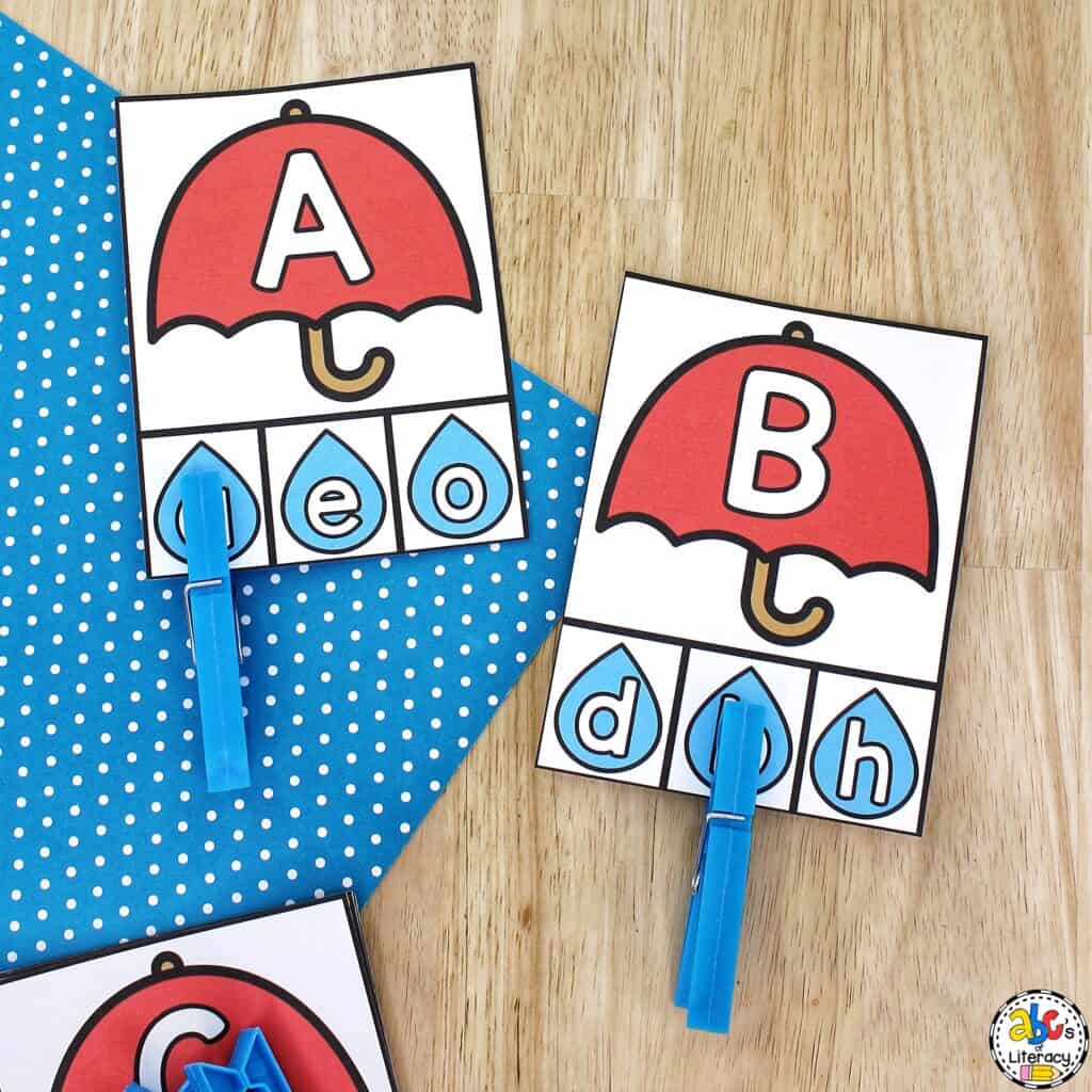 Free printable Umbrella Alphabet Clip Cards for preschool: Work on letter recognition, matching letters, fine motor skills, and more! fine motor activity