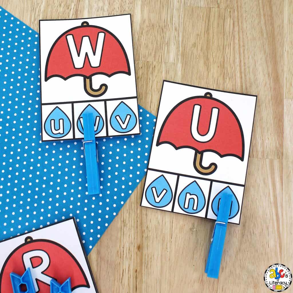 Free printable Umbrella Alphabet Clip Cards for preschool: Work on letter recognition, matching letters, fine motor skills, and more! letter matching activity