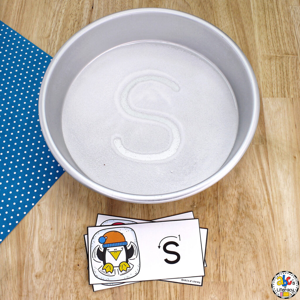 Snow Angel Alphabet Writing Tray: Practice writing strokes and capital & lowercase letter formation in this sensory activity Letter Writing Activity